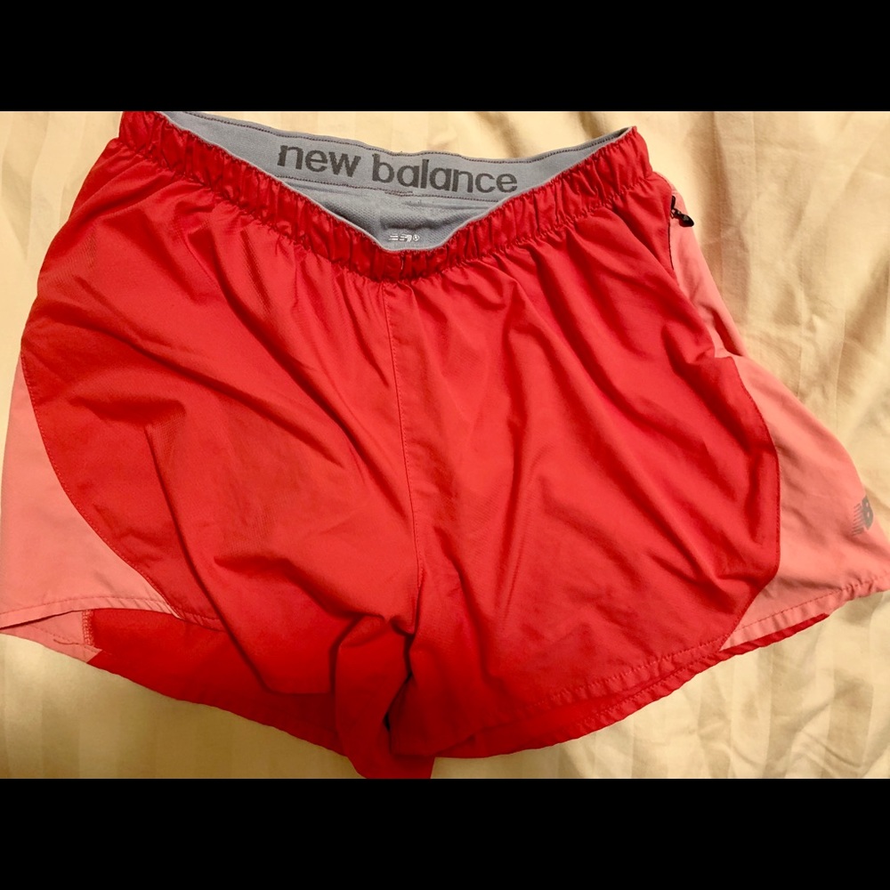 New Balance running shorts with zippered pockets